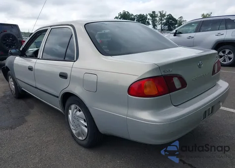 1999 Toyota Corolla Ce z USA, uszkodzony, nr VIN 2T1BR12E9XC180124